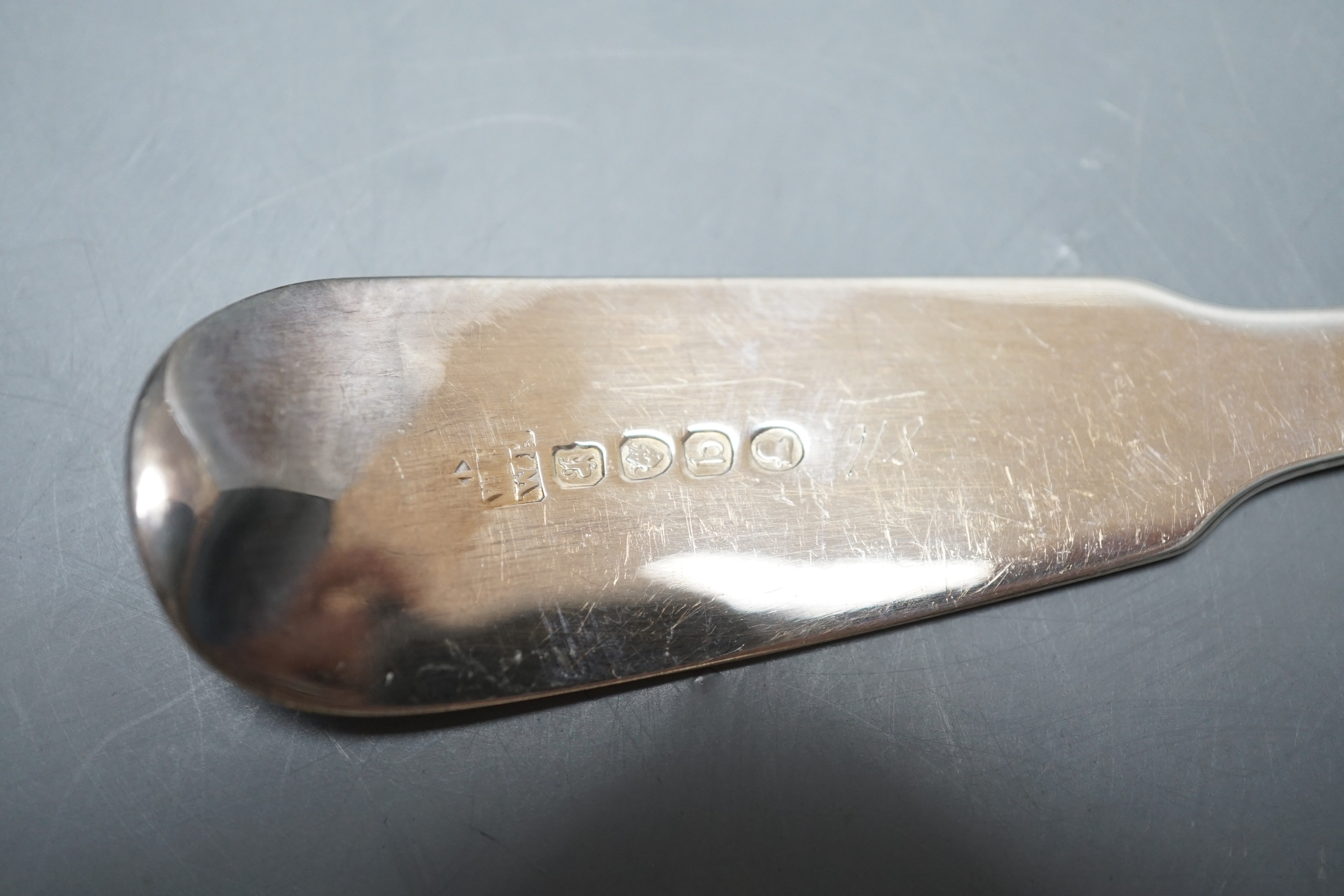 A late George III silver fiddle pattern embossed 'berry' basting spoon, Eley & Fearn, London, 1817, 30.6cm, 113 grams.